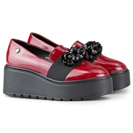 Ladies' red patent shoes on a platform 1