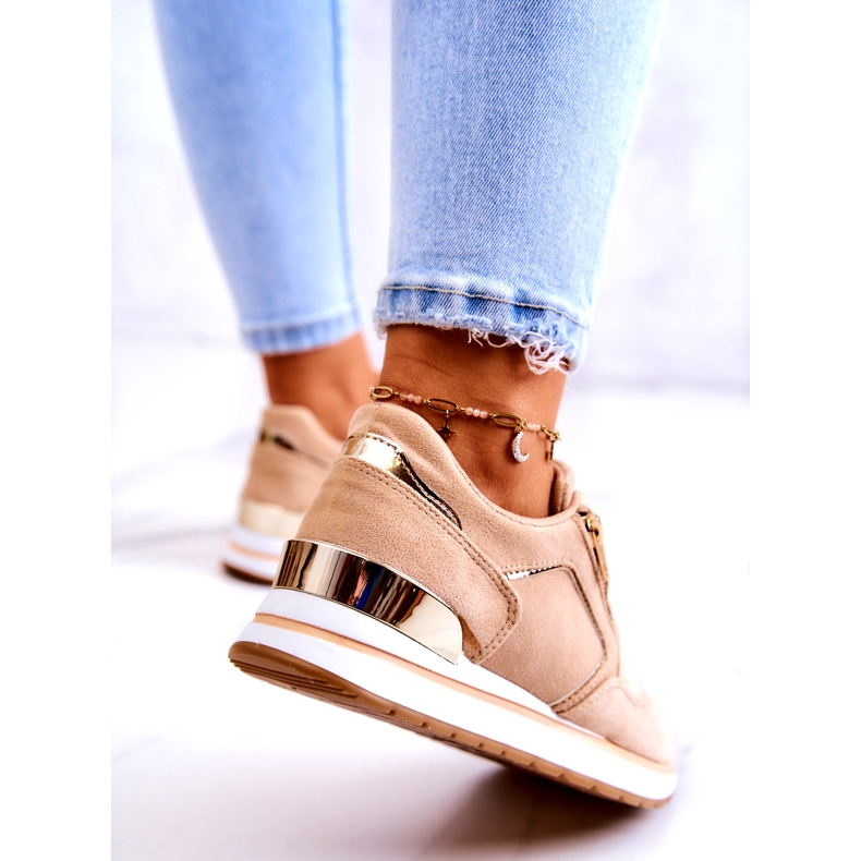 Women's suede sports shoes on the platform dark beige 1