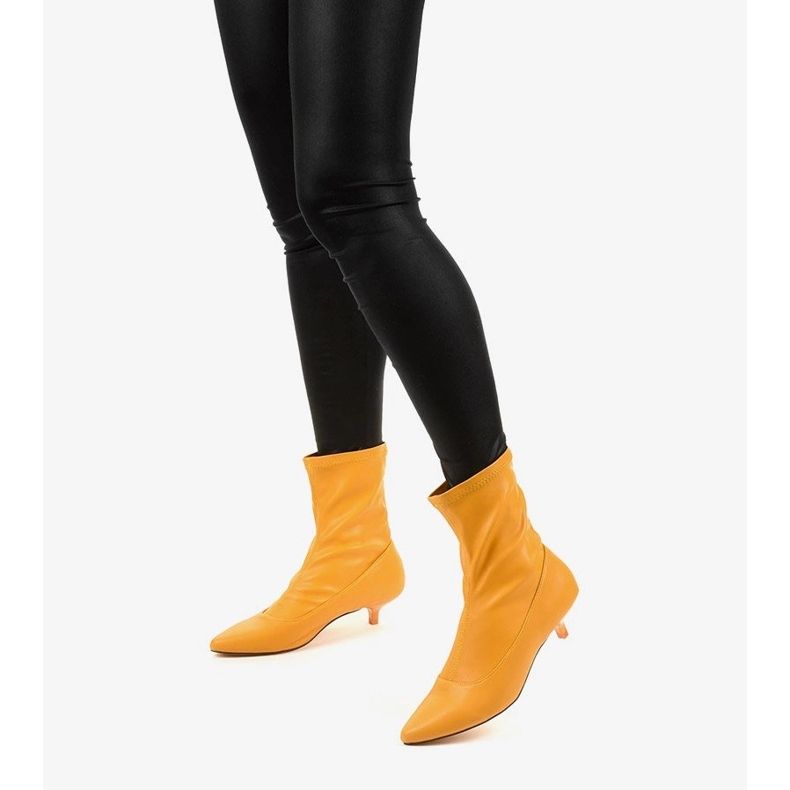 Yellow high heels with a Ragemour sock 1