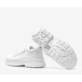 White sneakers on a thick Makenna sole 1
