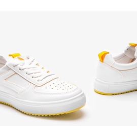 White and yellow sports sneakers from Maggie 1