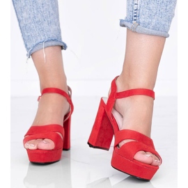 Red sandals on the post of Kimmie 1