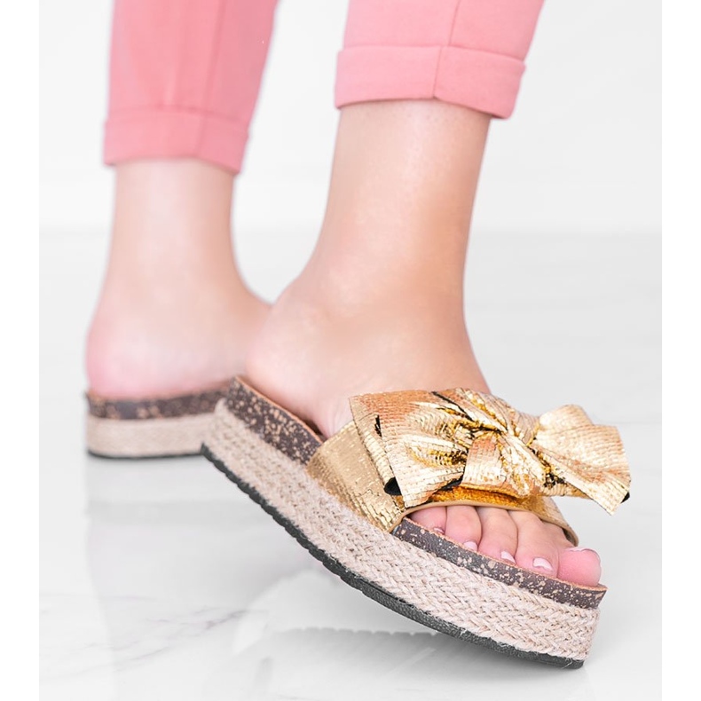 Columbia golden slippers with a bow 1