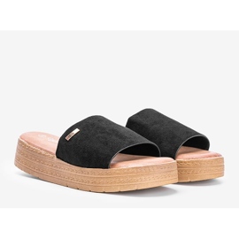 Black slippers on the platform 1