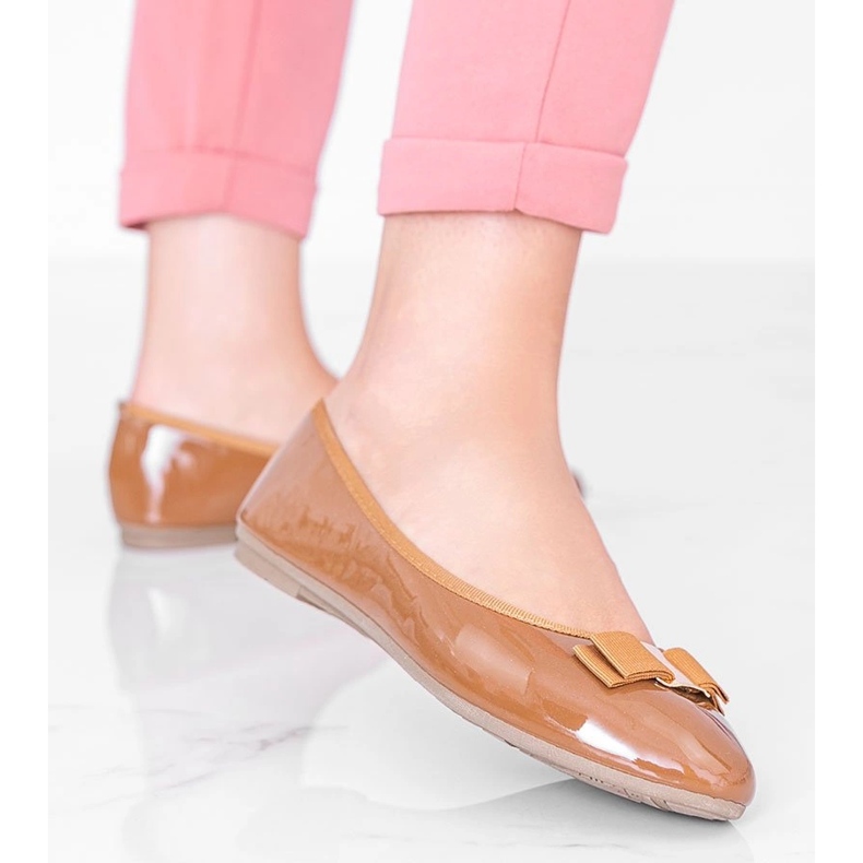 Brown patent ballerinas with a Yoko bow 1