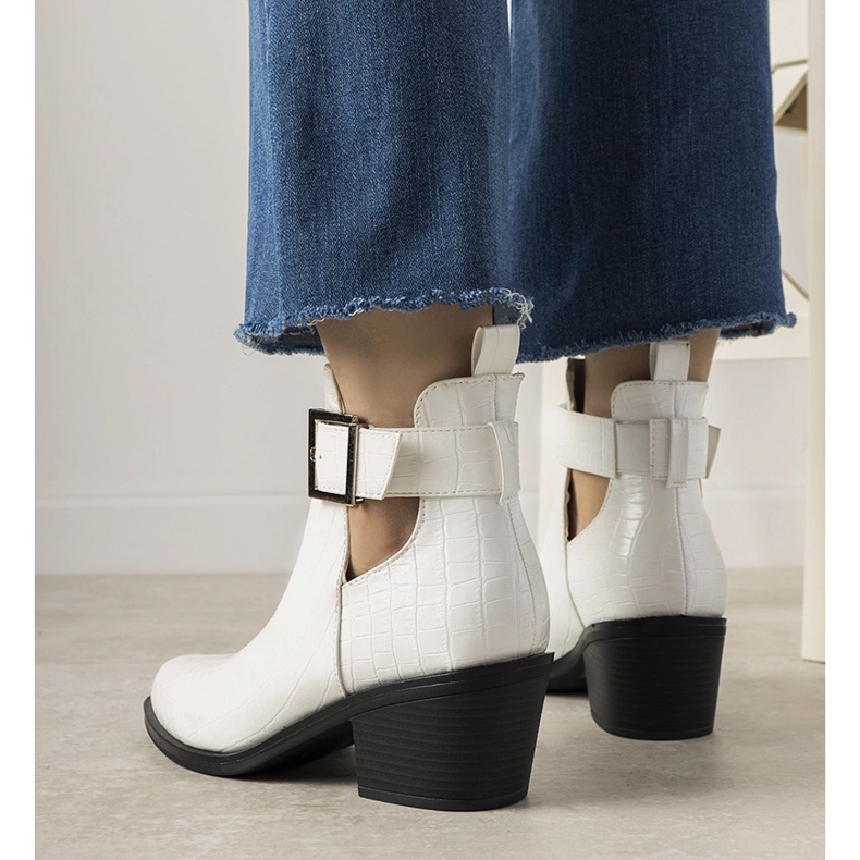 White ankle boots with Moderniso cutouts 1
