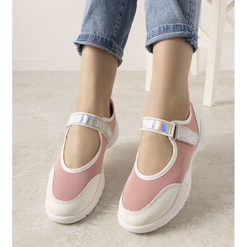 Pink and white trainers with a holographic Melania insert 1