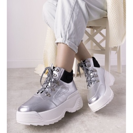 Silver sneakers on a high Eloquence sole 1