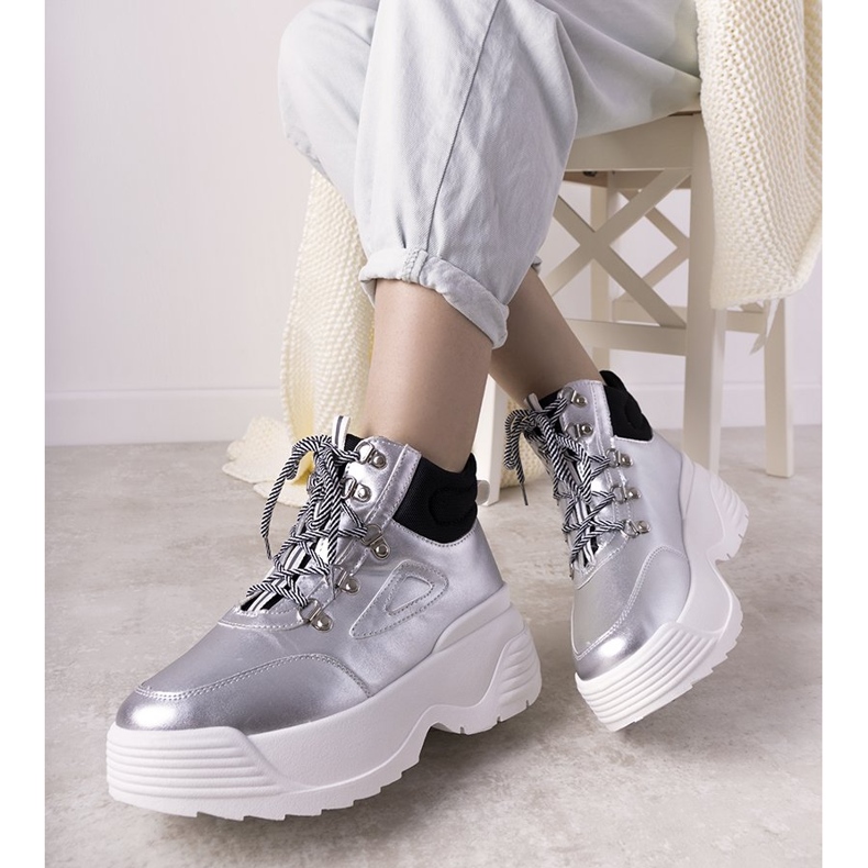 Silver sneakers on a high Eloquence sole 1