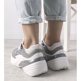 Silver sneakers on a high sole white 1