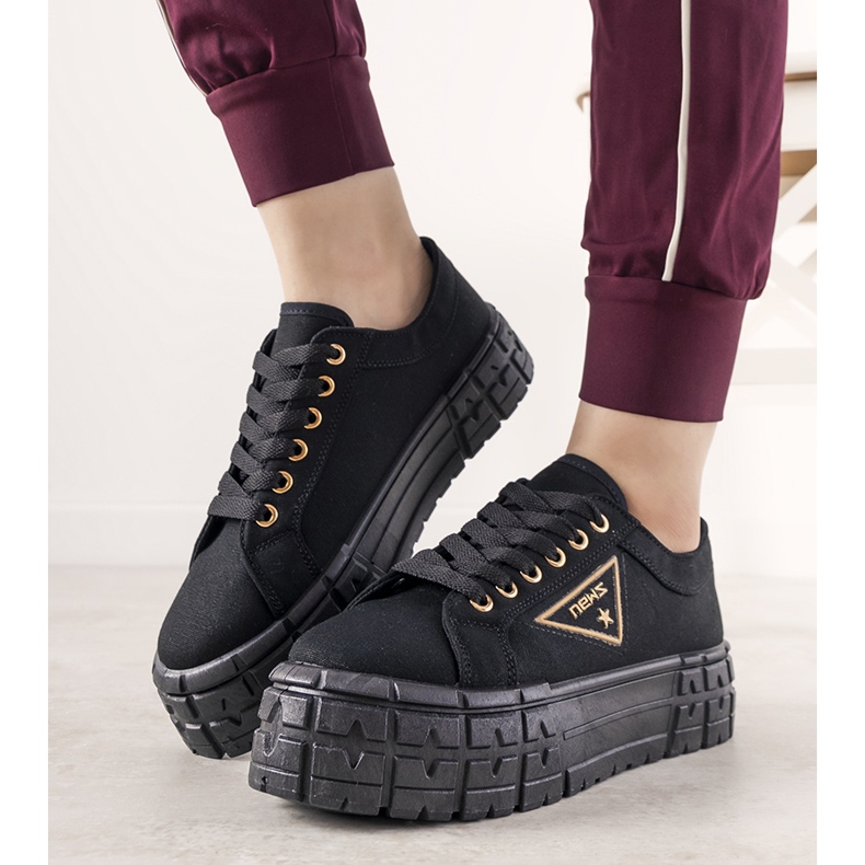 Black sneakers on a thick Giselle sole 1