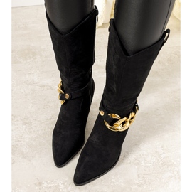 Black cowboy boots on the Effie post 1
