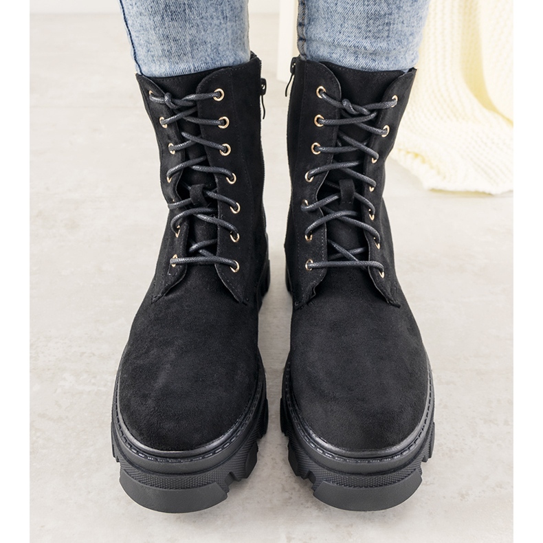 Black boots on a high Rudes sole 1