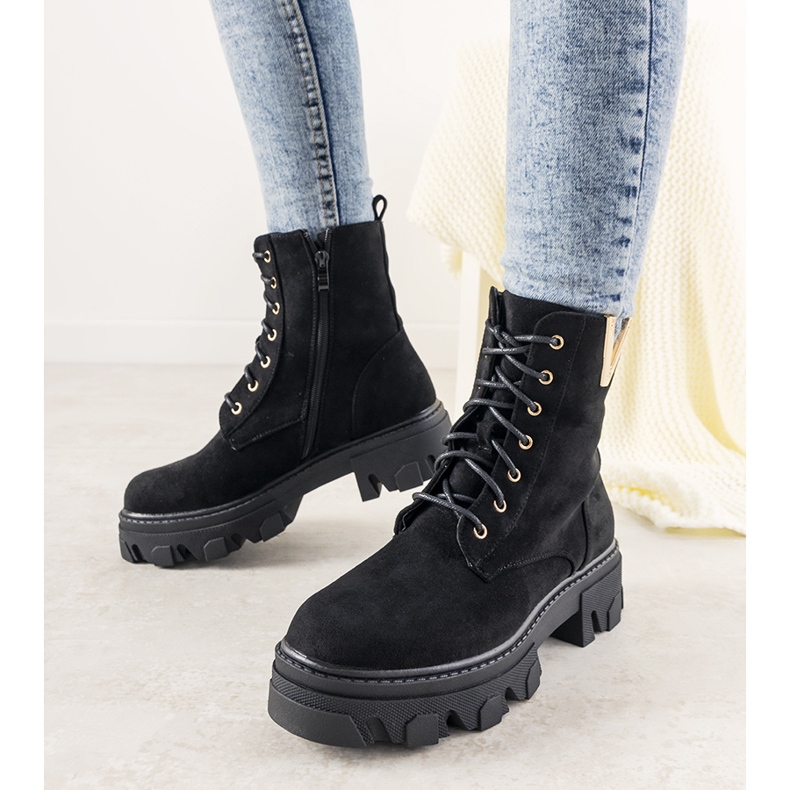 Black boots on a high Rudes sole 2