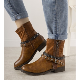 Brown boots with a studded Elffie headband 1