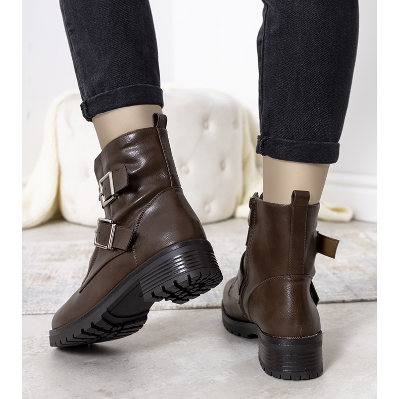 Santos brown boots with a decorative clasp 1