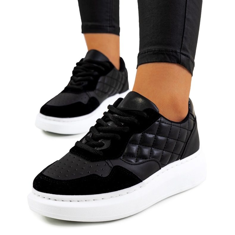 Black sneakers on the Gasperi platform 1