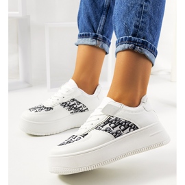 White sneakers on the Worden platform 1