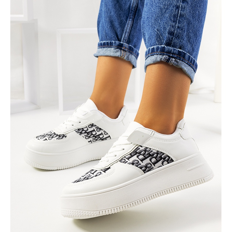 White sneakers on the Worden platform 1