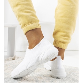 BM Aaron's white trainers 1