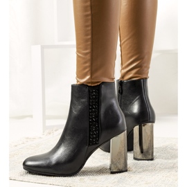 Black boots on a silver heel from Demott 2
