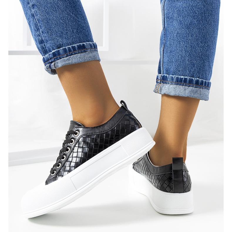 Black sneakers on a thick Luther sole 1