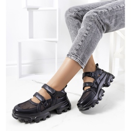 Black sneakers with a tractor sole from Djurs 1