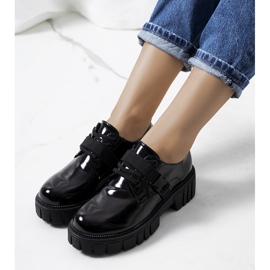 Black shoes on a tractor sole by Vellem 1