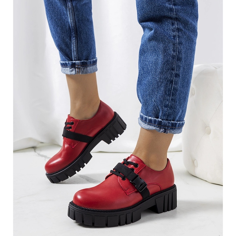 Red shoes on a tractor sole Marike 1