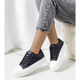 Black sneakers on the Birkett platform 1