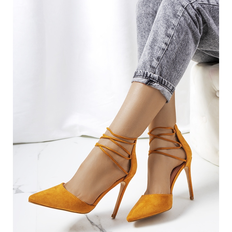 Brown leather heels with a Glover strap 1