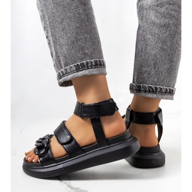 Black sandals on the Zepps platform 1