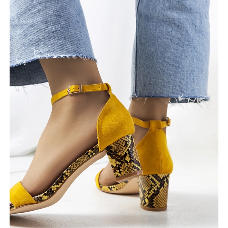 Yellow sandals on the post with the Azevedo snake motif 1