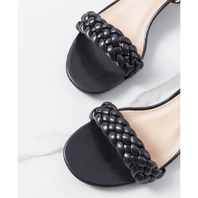 Black sandals on the Margo post 1