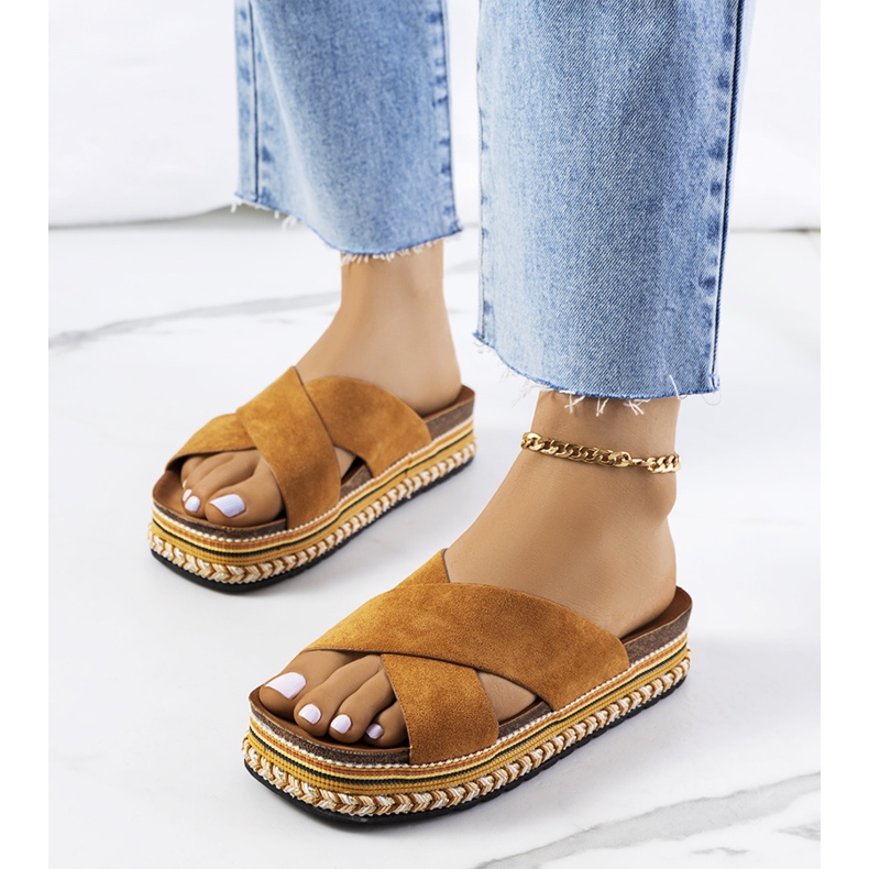 Brown slippers on the Muncho platform 1