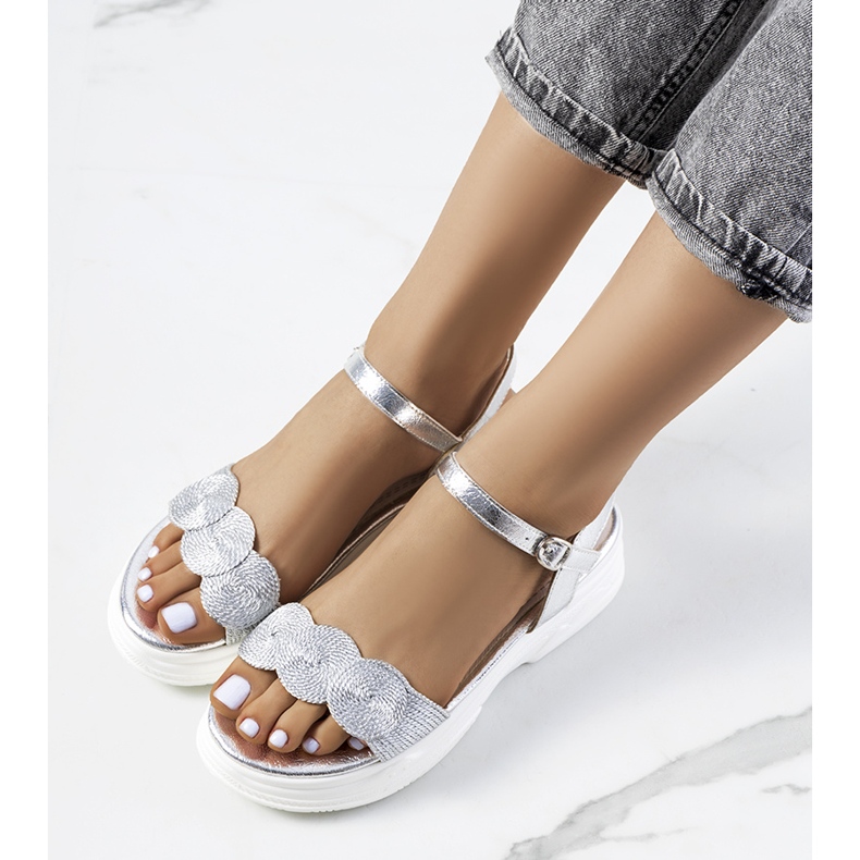 Silver sandals on the Nandy platform 1