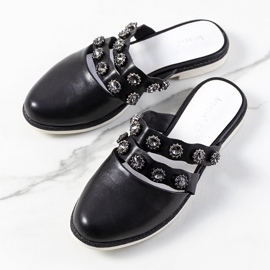 Black slippers decorated with Asselt studs 1
