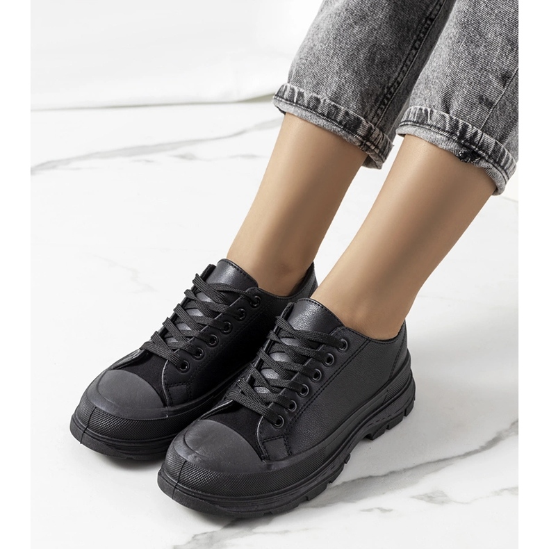 Black sneakers on a thick Nurbik sole 1 Black sneakers on a thick Nurbik sole 1