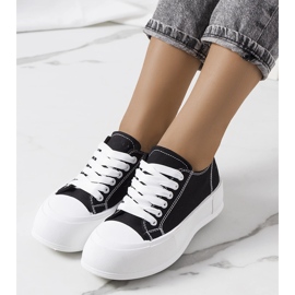 Black sneakers on the Louisal platform 1