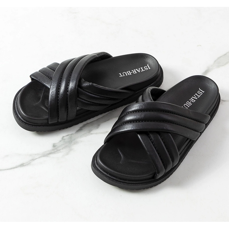 Black slippers on the Daintree platform 1