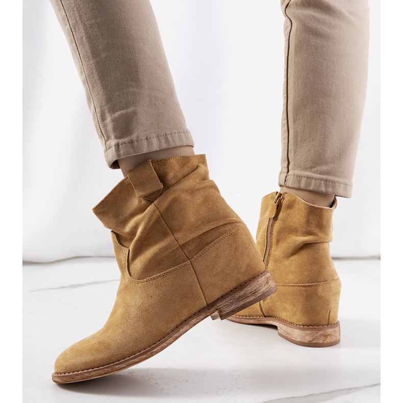 Dark beige boots on an indoor Hunjet wedge heel 1