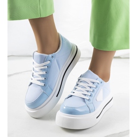 Blue sneakers with a thick Scrabster sole 1