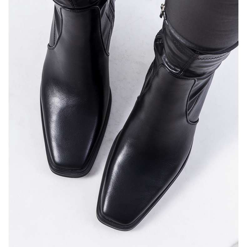 Black high-heeled boots from Livrame 1
