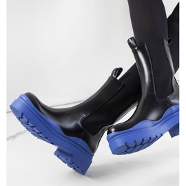 Black boots with a blue Nester sole 1