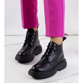 Black Solis boots 1