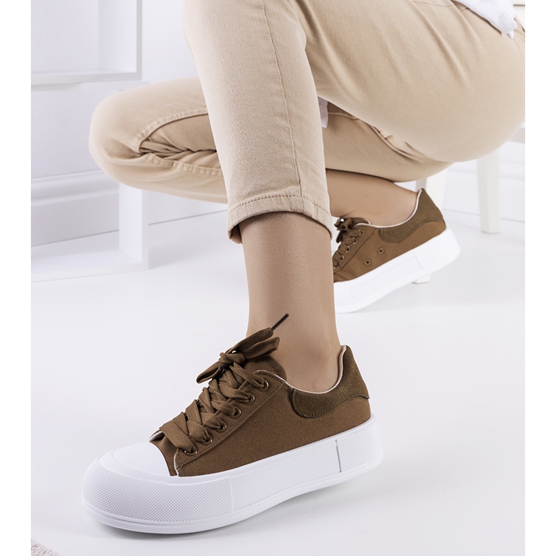 Green sneakers on the Kilkenny platform 1