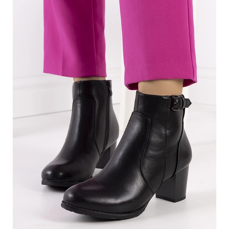 Black boots on a low post from Bogota 1