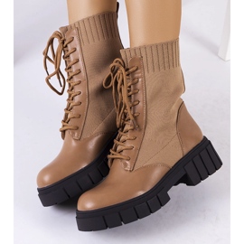 Brown boots with a flexible Ada upper 1