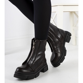 Brown boots with a decorative Neal zipper 1