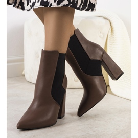 Brown Chelsea boots on the Hamilt post 1